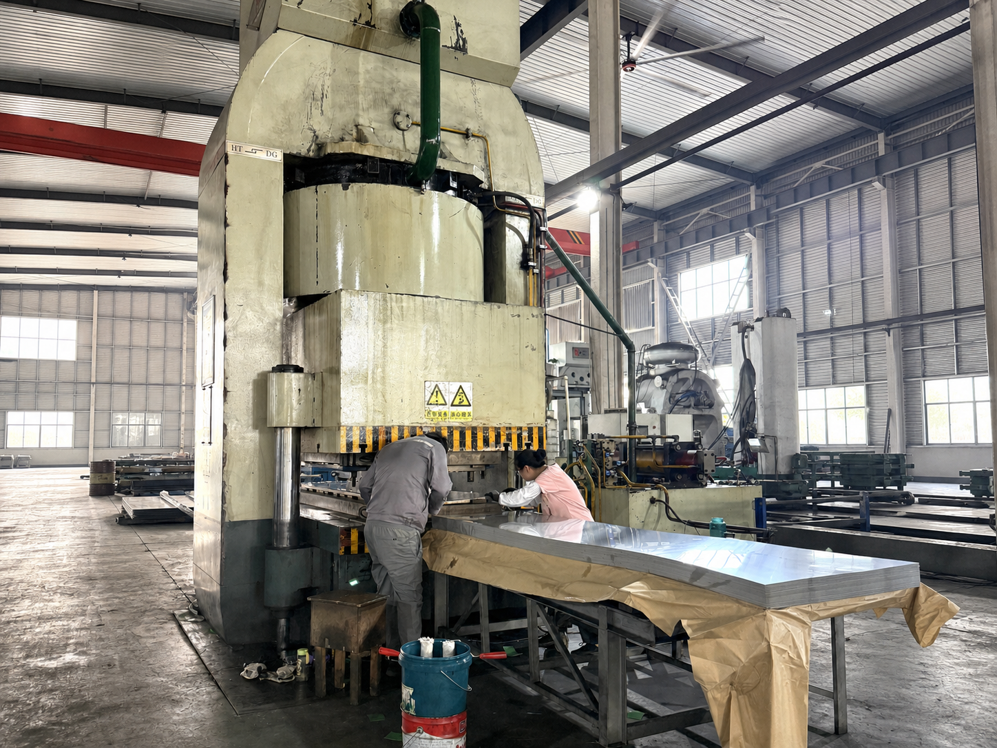 Plate forming press and production control